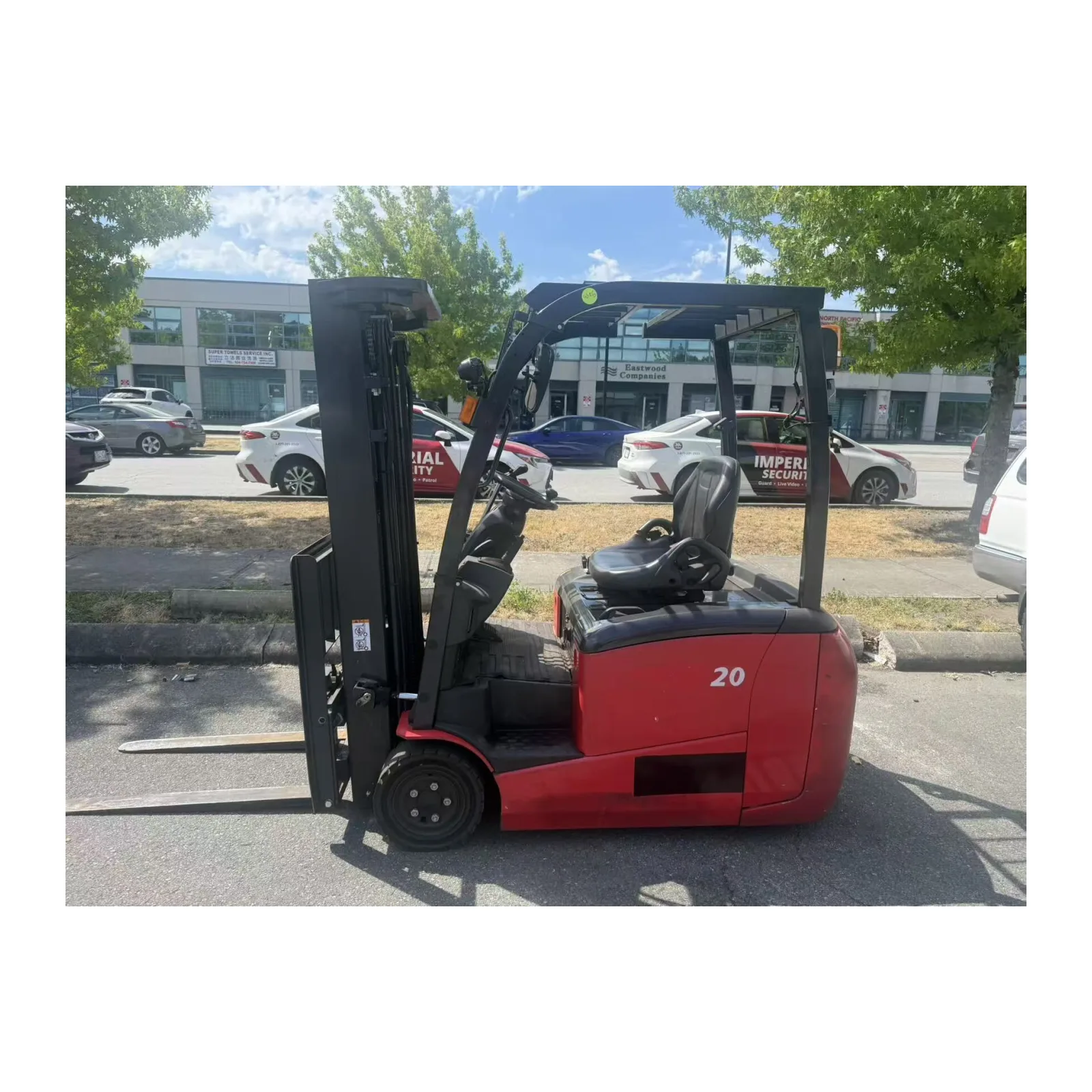 Electric forklift, red, left side view